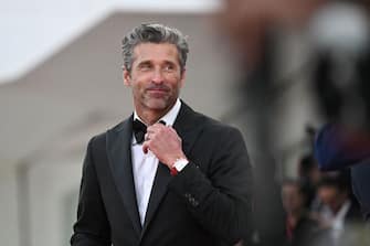 US actor Patrick Dempsey poses on the red carpet of the movie "Ferrari" presented in competion at the 80th Venice Film Festival on August 31, 2023 at Venice Lido. (Photo by Tiziana FABI / AFP) (Photo by TIZIANA FABI/AFP via Getty Images)