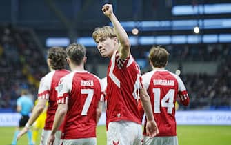 epa10544049 Denmark's Rasmus Hojlund celebrates after scoring the 1-0 lead during the UEFA Euro 2024 qualification soccer match between Kazakhstan and Denmark at Astana Arena in Astana, Kazakhstan, 26 March 2023.  EPA/Bo Amstrup  DENMARK OUT