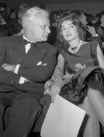 (Original Caption) Together in public for the first time since their celebrated quarrel two years ago, soprano Maria Callas and Antonio Ghiringhelli, superintendent of the La Scala Theater, attend a movie premiere here, February 6th. Their appearance together sparked rumors that Miss Callas might return to sing at La Scala next season.