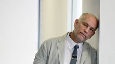 SYDNEY, AUSTRALIA - JANUARY 17:  American Actor, John Malkovich rests his head against a wall prior to the start of a press conference for "The Giacomo Variations" on January 17, 2011 in Sydney, Australia. Malkovic will perform on stage for the first time in Australia at the Sydney Opera House as part of the annual Sydney Festival.  (Photo by Lisa Maree Williams/Getty Images)