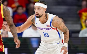 Lorenzo Brown (L) of Spain in action against Jose Alvarado (R) of Puerto Rico during the Basketball International Friendly match between Spain and Puerto Rico at WiZink Center on July 23, 2024 in Madrid, Spain.