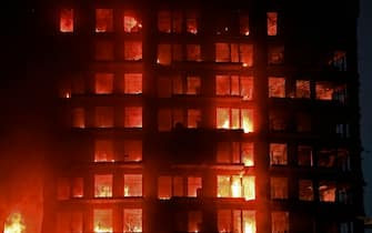 A huge fire rages through a multistorey residential block in Valencia on February 22, 2024. (Photo by Jose Jordan / AFP) (Photo by JOSE JORDAN/AFP via Getty Images)