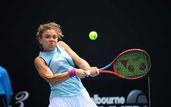 Jasmine Paolini of Italy hits a return against Rebecca Marino of Canada during their Gippsland Trophy Women's singles match in Melbourne on January 31, 2021. (Photo by William WEST / AFP) / -- IMAGE RESTRICTED TO EDITORIAL USE - STRICTLY NO COMMERCIAL USE -- (Photo by WILLIAM WEST/AFP via Getty Images)