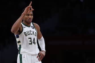 WASHINGTON, DC - NOVEMBER 20: Giannis Antetokounmpo #34 of the Milwaukee Bucks celebrates against the Washington Wizards during the second half at Capital One Arena on November 20, 2023 in Washington, DC. NOTE TO USER: User expressly acknowledges and agrees that, by downloading and or using this photograph, User is consenting to the terms and conditions of the Getty Images License Agreement.  (Photo by Patrick Smith/Getty Images)