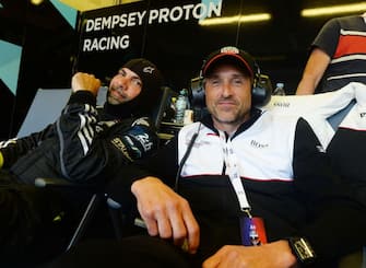 US actor and team manager Patrick Dempsey (R) waits in the pit of Dempsey Proton Racing Team during the 90th edition of the Le Mans 24 Hours endurance race, in Le Mans, north-western France, on June 12, 2022. (Photo by JEAN-FRANCOIS MONIER / AFP) (Photo by JEAN-FRANCOIS MONIER/AFP via Getty Images)