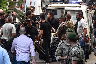 epa11610037 Paramedics transport an injured person to the American University of Beirut Medical Center (AUBMC) after an incident involving Hezbollah members' wireless devices in Beirut,  Lebanon, 17 September 2024. According to Lebanon s state news agency, several  wireless communication devices (pagers) were detonated using advanced technology.  Hundreds of people with various injuries have been arriving at Lebanese hospitals, according to the Lebanese Public Health Emergency Operations Center of the Ministry of Public Health.  EPA/WAEL HAMZEH