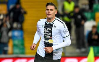 Udinese's Lorenzo Lucca celebrates after scoring a goal during the italian soccer Serie A match between Udinese Calcio vs Hellas Verona FC on december 03, 2023 at the Bluenergy stadium in Udine, Italy