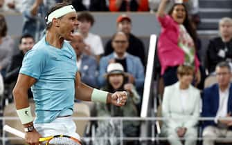 epa11373639 Rafael Nadal of Spain reacts during his Men's Singles 1st round match against Alexander Zverev of Germany during the French Open Grand Slam tennis tournament at Roland Garros in Paris, France, 27 May 2024.  EPA/MOHAMMED BADRA