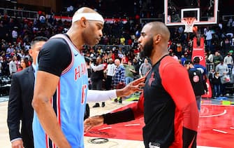 ATLANTA, GA - MARCH 19: Vince Carter #15 of the Atlanta Hawks and Chris Paul #3 of the Houston Rockets talk after the game on March 19, 2019 at State Farm Arena in Atlanta, Georgia.  NOTE TO USER: User expressly acknowledges and agrees that, by downloading and/or using this Photograph, user is consenting to the terms and conditions of the Getty Images License Agreement. Mandatory Copyright Notice: Copyright 2019 NBAE (Photo by Scott Cunningham/NBAE via Getty Images)