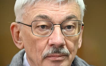 Oleg Orlov, the 70-year-old human rights campaigner and co-chair of the Nobel Prize winning Memorial group, who is charged with "discrediting" the Russian army, appears in court in Moscow on February 16, 2024. Orlov was originally fined by a court in October after a first trial, in a lighter-form of punishment that surprised many, including himself. But prosecutors then changed their minds, citing an "excessively light" punishment that did not correspond to the "danger to the public" that they said Orlov was. (Photo by Alexander NEMENOV / AFP) (Photo by ALEXANDER NEMENOV/AFP via Getty Images)