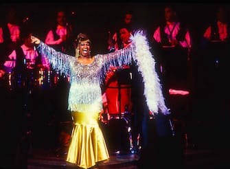 Cuban-American salsa singer Celia Cruz (1925 - 2003) performs at the JVC Jazz Festival concert 'Two Divas and a Lion' at Carnegie Hall, New York, New York, July 1, 1995. (Photo by Jack Vartoogian/Getty Images)