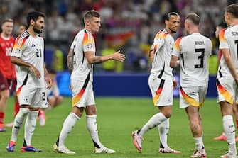 Toni Kroos (8) of Germany, Ilkay Gundogan (21) of Germany and Leroy Sane (19) of Germany pictured after a soccer game between the national teams of Switzerland and Germany on the third  matchday in Group A in the group stage of the UEFA Euro 2024 tournament , on Sunday 23 June 2024  in Frankfurt , Germany . (Photo by David Catry/Sportpix/Content Curation/Sipa USA)