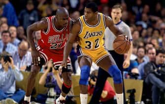 INGLEWOOD, CA - 1991:  Magic Johnson #32 of the Los Angeles Lakers posts up against Michael Jordan #23 of the Chicago Bulls during the 1991 NBA Finals played at the Great Western Forum in Inglewood, California. NOTE TO USER: User expressly acknowledges that, by downloading and or using this photograph, User is consenting to the terms and conditions of the Getty Images License agreement. Mandatory Copyright Notice: Copyright 1991 NBAE (Photo by Andrew D. Bernstein/NBAE via Getty Images)