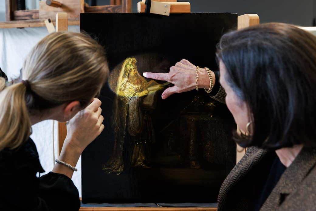 Researchers looking at Rembrandt's Vision of Zacharias in the Temple. Photo: Rijksmuseum/Kelly Schenk