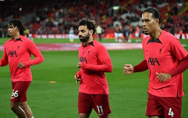 LIVERPOOL, ENGLAND - OCTOBER 29: (THE SUN OUT,THE SUN ON SUNDAY OUT ) Trent Alexander-Arnold of Liverpool and Virgil van Dijk of Liverpool with Mohamed Salah of Liverpool before the Premier League match between Liverpool FC and Leeds United at Anfield on October 29, 2022 in Liverpool, England. (Photo by Andrew Powell/Liverpool FC via Getty Images)
