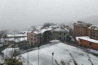 A football ground is covered in snow as city goes through a heavy snowfall, in Genoa, Italy, 28 December 2020ANSA/SIMONE ARVEDA