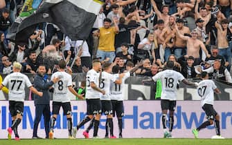 Spezia's Salvatore Esposito celebrates with teammates after scoring the 2-0 goal during the italian soccer Serie A match Spezia Calcio vs AC Milan at the Alberto Picco stadium in La Spezia, Italy, 13 May 2023
ANSA/FABIO FAGIOLINI