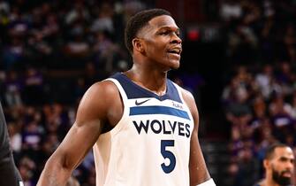 PHOENIX, AZ - APRIL  26: Anthony Edwards #5 of the Minnesota Timberwolves looks on during the game against the Phoenix Suns on April 26, 2024 at Footprint Center in Phoenix, Arizona. NOTE TO USER: User expressly acknowledges and agrees that, by downloading and or using this photograph, user is consenting to the terms and conditions of the Getty Images License Agreement. Mandatory Copyright Notice: Copyright 2024 NBAE (Photo by Kate Frese/NBAE via Getty Images)