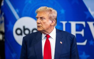 epa11597700 Republican presidential nominee and former US president Donald Trump speaks to members of the media following his presidential debate with Vice President Kamala Harris in the debate's press file in Philadelphia, Pennsylvania, USA, 10 September 2024. The two candidates faced off for 90 minutes in their only planned debate of the 2024 presidential election.  EPA/JIM LO SCALZO