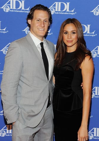 BEVERLY HILLS, CA - OCTOBER 11:  Trevor Engelson (L) and wife actress Meghan Markle arrives at the Anti-Defamation League Entertainment Industry Awards Dinner Honoring Ryan Kavanaugh at The Beverly Hilton hotel on October 11, 2011 in Beverly Hills, California.  (Photo by Michael Kovac/WireImage)
