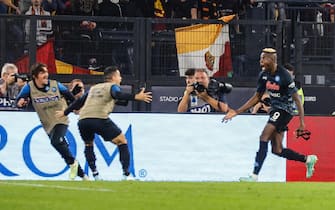 Napoli's Victor Osimhen (R) celebrates with teammates after scoring during the Italian Serie A soccer match between Roma and Napoli at the Olimpico stadium in Rome, Italy, 23 October 2022.
ANSA/FABIO FRUSTACI