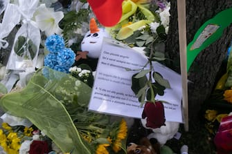 People continue to leave flowers at the place where the car accident occurred where a 5-year-old child died, in Casal Palocco, Rome, Italy, 16 June 2023.   ANSA/EMANUELE VALERI