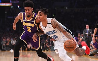 LOS ANGELES, CA - JANUARY 15: Quinn Cook #2 of the Los Angeles Lakers guards Markelle Fultz #20 of the Orlando Magic as he drives to the basket in the first half of the game at Staples Center on January 15, 2020 in Los Angeles, California. NOTE TO USER: User expressly acknowledges and agrees that, by downloading and/or using this Photograph, user is consenting to the terms and conditions of the Getty Images License Agreement.(Photo by Jayne Kamin-Oncea/Getty Images)