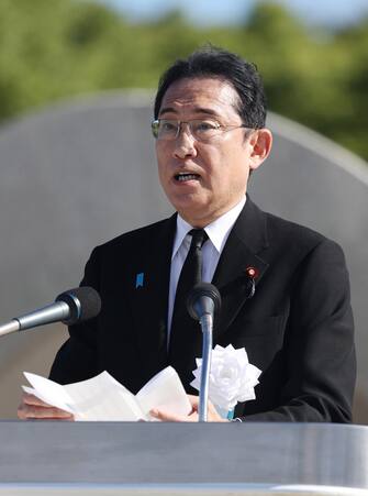 epa10786937 Japanese Prime Minister Fumio Kishida delivers a speech during the memorial service for victims of the atomic bombing of Hiroshima at Hiroshima Peace Memorial Park in Hiroshima, Hiroshima Prefecture, western Japan, 06 August 2023, marking the 78th anniversary of the atomic bombing. Hiroshima City has announced the toll of victims from the atomic bombing rose to about 140,000. The number of victims was counted as the end of 1945 after the August 6 bombing.  EPA/JIJI PRESS JAPAN OUT EDITORIAL USE ONLY