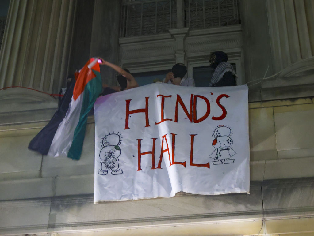 NEW YORK, UNITED STATES - APRIL 30: A group of Columbia University students, advocating for Palestinians, access the iconic Hamilton Hall building as they gather to stage a demonstration at the campus in New York, United States on April 30, 2024. Protests are sweeping college campuses across the US following a police attempt to clear a pro-Palestinian encampment at Columbia University, resulting in the arrest of over 100 students. Columbia University asked students on Monday to 'voluntarily disperse' amid stalled talks, threatening the students with suspension. (Photo by Selcuk Acar/Anadolu via Getty Images)