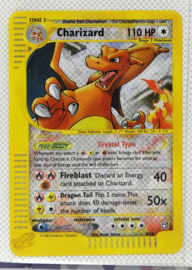 Story from Jam Press (Pokemon Cards)

Pictured: A Charizard “topper card” also sold for £1,235.

Box of rare Pokémon cards sells for £10,400.

A box of rare Pokémon cards has sold for £10,400.

The collection was released in 2000.

It is the Japanese version of the “Neo Discovery Set” – which was first released in the UK.

The box has never been opened and it is still sealed.

It contains 60 packs of trading cards from the popular Japanese series.

Although it was only estimated to rake in £5,000 at auction, it was sold for more than double that.

As it is unopened, there is a possibility it has expensive and rare cards inside – explaining the extortionate price tag.

The “Crossing the Ruins Japanese Sealed Booster Box” is still in ‘excellent condition.’

It was sold at auction by Ewbanks, in Woking, Surrey alongside other pricey Pokémon cards.

Another sealed booster box sold for £6,240 despite only expecting to make £3,500.

The ‘Team Rocket Unlimited Booster box’ contained just 36 packs of trading cards.

However, it has minor damage including dents and a tear in the seal.

A single trading card sold for a shocking £2,470.

It features a picture of the character Pikachu wearing a 'Charizard' poncho.

The card was a Japanese exclusive and released in 2016.

A Charizard “topper card” also sold for £1,235.

The rare card is in near mint condition and comes in a set of 12.

A Pokémon CD sold for a staggering £1,040.

The sealed promo CD was released in 1998 and comes with a pack of cards.

Pokémon trading cards became popular amongst 90s school kids following the success of the video game series.

More than 52.9 billion cards have been sold worldwide.

ENDS