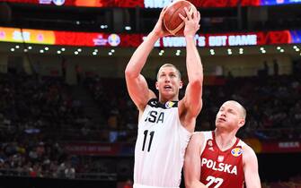 BEIJING, CHINA - SEPTEMBER 14: Mason Plumlee #11 of Team USA shoots the ball against Team Poland during the 2019 FIBA World Cup Classification 7-8 at the Cadillac Arena on September 14, 2019 in Beijing, China.  NOTE TO USER: User expressly acknowledges and agrees that, by downloading and/or using this Photograph, user is consenting to the terms and conditions of the Getty Images License Agreement. Mandatory Copyright Notice: Copyright 2019 NBAE (Photo by Garrett W. Ellwood/NBAE via Getty Images)