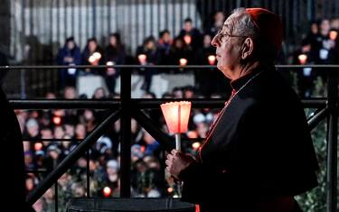 Angelo De Donatis at the Via Crucis - Way of the Cross torchlight procession on Good Friday in front of Colosseum in Rome, Italy, 07 April 2023.
ANSA/FABIO FRUSTACI