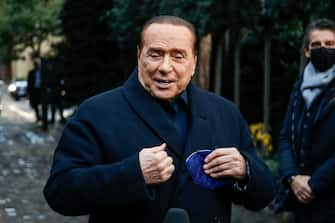 Forza Italia leader Silvio Berlusconi speaks to journalists at the end of the center-right summit at Villa Grande, Rome, Italy, 23 December 2021. ANSA/FABIO FRUSTACI