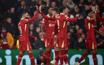 epa11843036 Mohamed Salah (L) of Liverpool celebrates with teammates after scoring the 1-0 opening goal during the UEFA Champions League league phase match between Liverpool FC and LOSC Lille, in Liverpool, Britain, 21 January 2025.  EPA/ADAM VAUGHAN