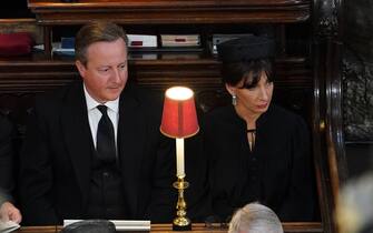 LONDON, ENGLAND - SEPTEMBER 19: David Cameron and Samantha Cameron attend the State Funeral of Queen Elizabeth II at Westminster Abbey on September 19, 2022 in London, England.  Elizabeth Alexandra Mary Windsor was born in Bruton Street, Mayfair, London on 21 April 1926. She married Prince Philip in 1947 and ascended the throne of the United Kingdom and Commonwealth on 6 February 1952 after the death of her Father, King George VI. Queen Elizabeth II died at Balmoral Castle in Scotland on September 8, 2022, and is succeeded by her eldest son, King Charles III. (Photo by Gareth Fuller - WPA Pool/Getty Images)