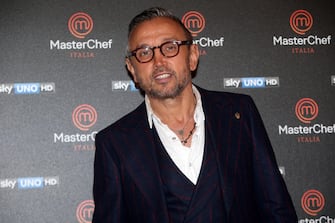 Chef Bruno Barbieri poses for photographers on the sidelines of the press conference organized to present the new edition of the Sky Masterchef program, Milan, 20 December 2016. ANSA / MATTEO BAZZI