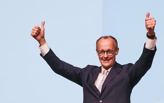 epa11913706 Christian Democratic Union (CDU) party Chairman Friedrich Merz reacts during election campaign event in Oberhausen, Germany, 21 February 2025. Germany will hold early federal elections on 23 February 2025 to elect a new Bundestag (parliament).  EPA/RONALD WITTEK