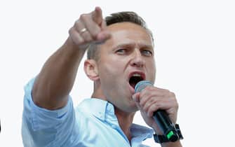 Russian opposition leader Alexei Navalny addresses demonstrators during a rally to support opposition and independent candidates after authorities refused to register them for September elections to the Moscow City Duma, Moscow, July 20, 2019. (Photo by Maxim ZMEYEV / AFP)        (Photo credit should read MAXIM ZMEYEV/AFP via Getty Images)