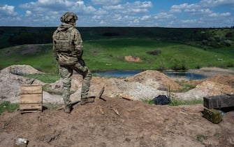 DONBAS REGION, UKRAINE - APRIL 26: A Ukrainian soldier looks over a target range, as Ukrainian Armed Forces brigades train for a critical and imminent spring counteroffensive against Russian troops, which invaded 14 months earlier, in the Donbas region, Ukraine, on April 26, 2023. Bolstered by billions of dollars worth of American and European military and economic support, Ukrainian forces are aiming to retake significant territory captured by Russia last year, as well as parts of Crimea and the eastern Donbas region, where Russian troops and local allies seized control in 2014. The counteroffensive is critical for Ukraine to show U.S. and Western donors that it can win on the battlefield and reverse Russian gains, and so deserves continued support. (Photo by Scott Peterson/Getty Images)