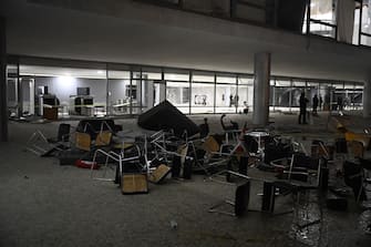 BRASILIA, BRAZIL - JANUARY 8: Damaged furniture are seen piled in front of the Palacio do Planalto (the official workplace of the president of Brazil) following a protest by supporters of Brazil's former President Jair Bolsonaro against President Luiz Inacio Lula da Silva, in Brasilia, Brazil, on January 8, 2023. (Photo by Mateus Bonomi/Anadolu Agency via Getty Images)