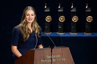 (FILES) Spanish Crown Princess of Asturias Leonor delivers a speech during the 2023 Princess of Asturias award ceremony at the Campoamor theatre in Oviedo on October 20, 2023. Princess Leonor, the heiress to the Spanish crown, will swear loyalty to the constitution on October 31 on her 18th birthday, helping to turn the page on the scandal-tainted reign of her grandfather, Juan Carlos. After taking the oath Princess Leonor can legally succeed her father, King Felipe VI, and automatically becomes head of state in the event of the monarch's absence. (Photo by MIGUEL RIOPA / AFP)