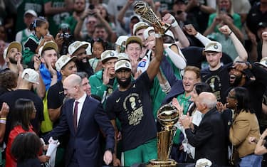 BOSTON, MASSACHUSETTS - JUNE 17: Jaylen Brown #7 of the Boston Celtics holds up the Bill Russell NBA Finals Most Valuable Player award after Boston's 106-88 win against the Dallas Mavericks in Game Five of the 2024 NBA Finals at TD Garden on June 17, 2024 in Boston, Massachusetts. NOTE TO USER: User expressly acknowledges and agrees that, by downloading and or using this photograph, User is consenting to the terms and conditions of the Getty Images License Agreement. (Photo by Adam Glanzman/Getty Images)