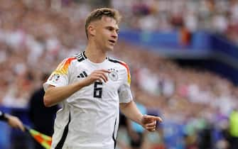 epa11459763 Joshua Kimmich of Germany in action during the UEFA EURO 2024 quarter-finals soccer match between Spain and Germany, in Stuttgart, Germany, 05 July 2024.  EPA/RONALD WITTEK