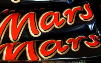 Mars chocolate bars packaging are seen in a shop in Sulkowice, Poland on August 12, 2021. (Photo by Jakub Porzycki/NurPhoto via Getty Images)