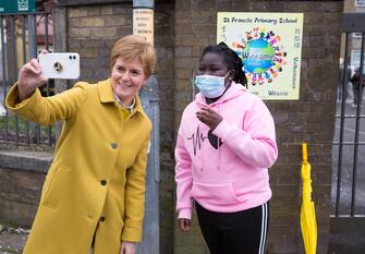 epa09181768 SNP leader Nicola Sturgeon poses for a photo at St Francis  Primary School in the Gorbals, Glasgow, Scotland, Britain, 06 May 2021. Scotland holds parliamentary elections amid coronavirus pandemic and calls for a second referendum on Scottish independence.  EPA/ROBERT PERRY