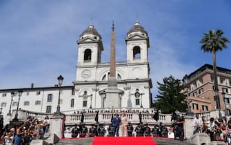 TOPSHOT - US producer and actor Tom Cruise (L) and US film director Christopher McQuarrie pose at Trinita dei Monti ahead of the premiere of "Mission: Impossible - Dead Reckoning Part One" movie in Rome, on June 19, 2023. (Photo by Tiziana FABI / AFP) (Photo by TIZIANA FABI/AFP via Getty Images)