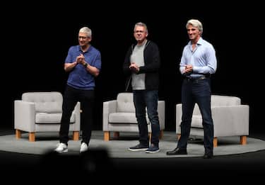 CUPERTINO, CALIFORNIA - JUNE 10: (L-R) Apple CEO Tim Cook, Apple senior vice president of machine learning and AI strategy John Giannandrea and Apple senior vice president of software engineering Craig Federighi look on during the Apple Worldwide Developers Conference (WWDC) on June 10, 2024 in Cupertino, California. Apple will announce plans to incorporate artificial intelligence (AI) into Apple software and hardware. (Photo by Justin Sullivan/Getty Images)