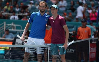 MIAMI GARDENS, FLORIDA - APRIL 02:  Daniil Medvedev of Russia and Jannik Sinner of Italy pose at the net before the Mens Finals of the Miami Open at Hard Rock Stadium on April 02, 2023 in Miami Gardens, Florida. (Photo by Al Bello/Getty Images)