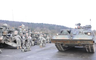 Troopers assigned to 4th Squadron, 2nd Cavalry Regiment and Dutch soldiers from the 42nd Battle Group test interoperability maintenance capabilities by hooking up a Leopard Recovery Tank to a Stryker during Allied Spirit I at Hohenfels Training Area located in Hohenfels, Germany, Jan. 19, 2015. The purpose of the exercise is to conduct multinational training as well as improving allied interoperability between U.S. and NATO forces. Allied Spirit I, Day Seven, Jan. 19, 2015 150119-A-WS244-166