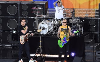 , New York, NY - 20190719- Blink-182 Perform On The Good Morning America Summer Concert Series. 

-PICTURED: Mark Hoppus, Travis Barker and Matt Skiba
-PHOTO by: Media Punch/INSTARimages.com

This is an editorial, rights-managed image. Please contact Instar Images LLC for licensing fee and rights information at sales@instarimages.com or call +1 212 414 0207 This image may not be published in any way that is, or might be deemed to be, defamatory, libelous, pornographic, or obscene. Please consult our sales department for any clarification needed prior to publication and use. Instar Images LLC reserves the right to pursue unauthorized users of this material. If you are in violation of our intellectual property rights or copyright you may be liable for damages, loss of income, any profits you derive from the unauthorized use of this material and, where appropriate, the cost of collection and/or any statutory damages awarded